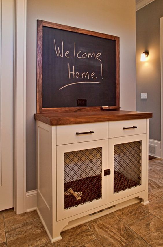Hiding your pet's crate within entryway furniture is the perfect #interiordesign solution.