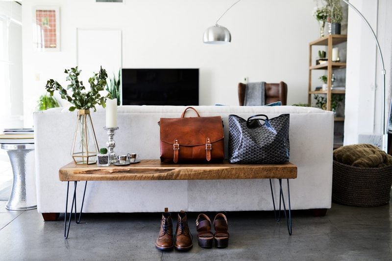 living room - wooden bench - leather shoes - leather bags
