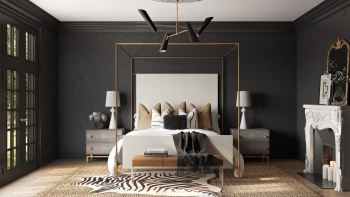 brass canopy bed in a chic modern black bedroom