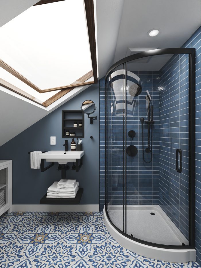 patterned floor tile in bathroom with blue walls
