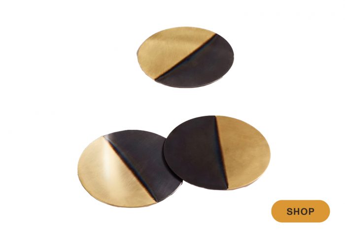 gold and black coasters