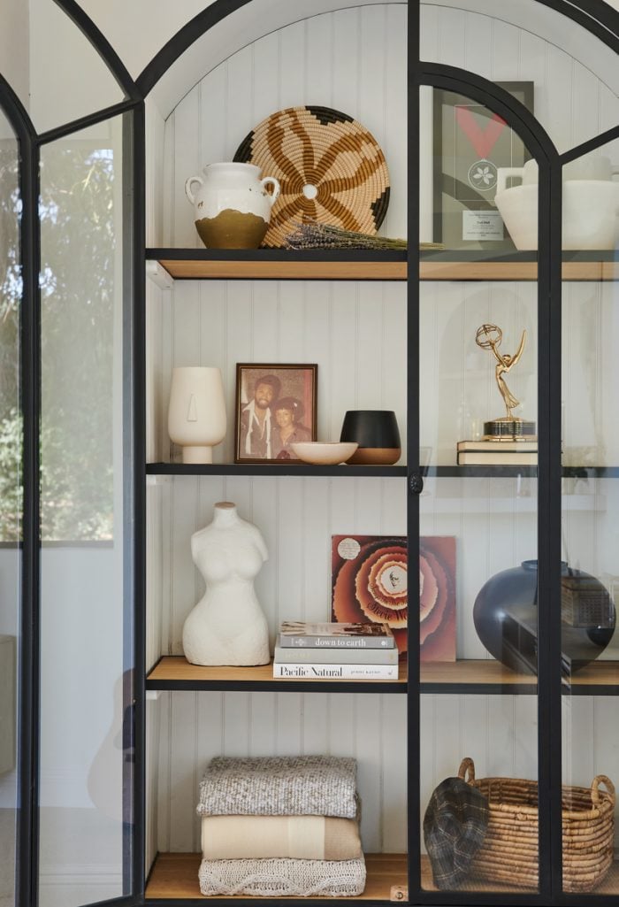 styled cabinet in Emmy winner Zuri Hall's living room