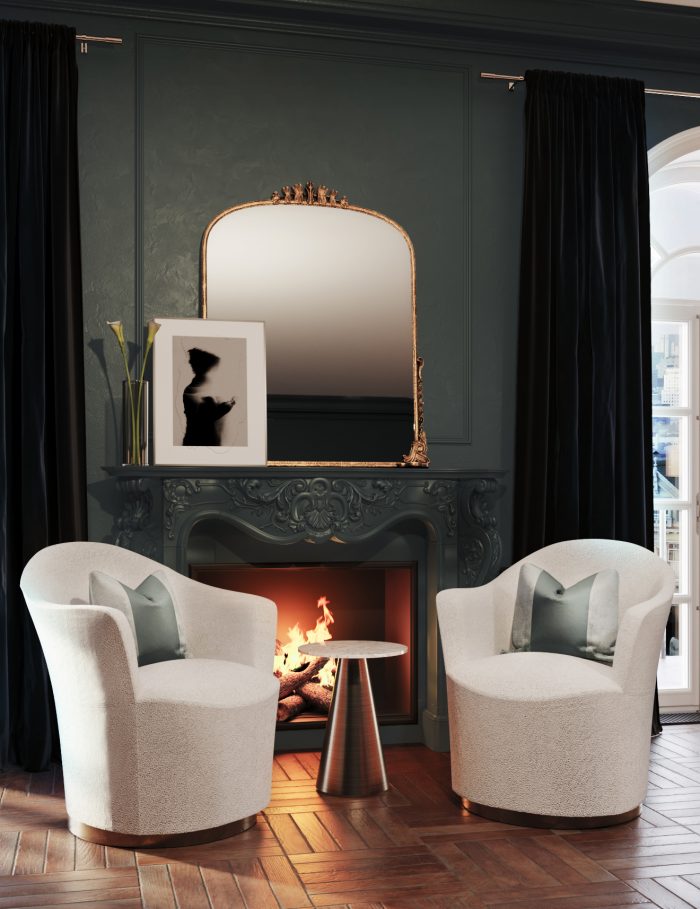 Boucle chairs in moody black bedroom by fireplace